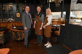 Café opening marks completion of Arthur’s guesthouse development. Pictured with Ulster Bank business development manager Derick Wilson are owners Lynne and Jonathan McCabe