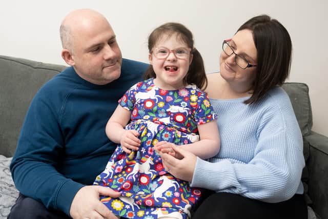 Amelie Cummins with her parents Michelle and Alan from Co Down, who took a disability discrimination case against a nursery school in Bangor, Co Down