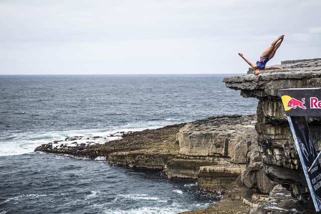 Rhiannan Iffland of Australia dives from the 21 metre platform during the first stop of the Red Bull Cliff Diving World Series at the Serpent`s Lair, Inis Mor, Ireland. Credit: Romina Amato / Red Bull Content Pool