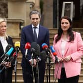 Taoiseach Simon Harris with First Minister Michelle O'Neill and deputy First Minister Emma Little-Pengelly, during a press conference outside Stormont Castle after a meeting as the Taoiseach made his first official visit to Northern Ireland