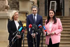 Taoiseach Simon Harris with First Minister Michelle O'Neill and deputy First Minister Emma Little-Pengelly, during a press conference outside Stormont Castle after a meeting as the Taoiseach made his first official visit to Northern Ireland