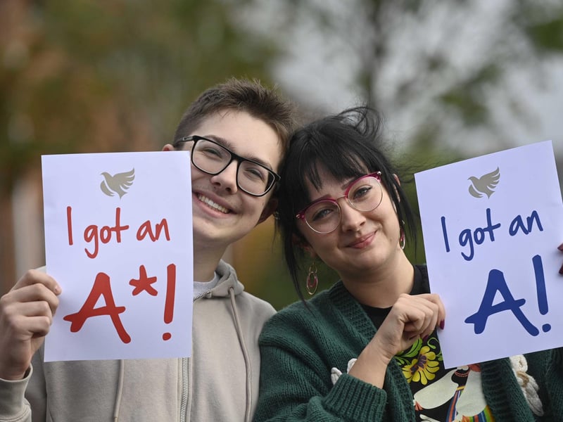 Wojciech Sobiecki celebrates his GCSE results with his sister Nikola Sobiecka at Hazelwood Integrated College in Newtownabbey
