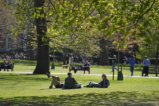 People enjoying the sunny weather in St James's Park in London. Picture date: Sunday April 6, 2025. PA Photo. Photo credit should read: Jordan Pettitt/PA Wire