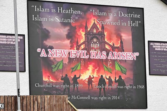 Police are treating the erection of an anti-Islam mural in Newtownabbey as a hate incident and potential criminal damage. Picture By: Pacemaker Press.