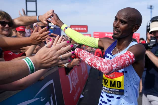 Sir Mo Farah greets fans after completing the Men's Elite Race of the AJ Bell Great North Run 2023 through Newcastle upon Tyne, Gateshead and South Shields. (Photo by Owen Humphreys/PA Wire).