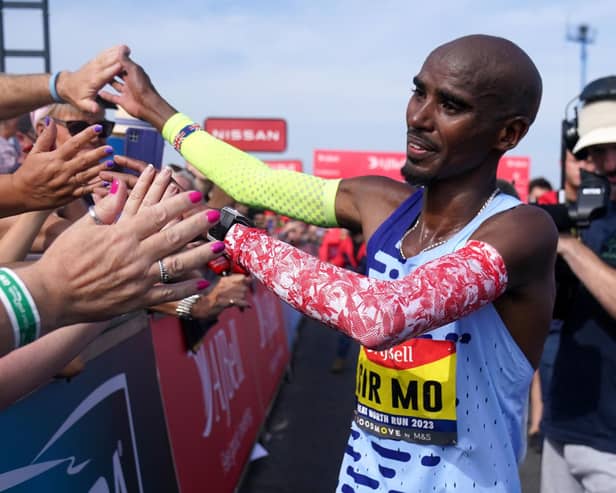 Sir Mo Farah greets fans after completing the Men's Elite Race of the AJ Bell Great North Run 2023 through Newcastle upon Tyne, Gateshead and South Shields. (Photo by Owen Humphreys/PA Wire).