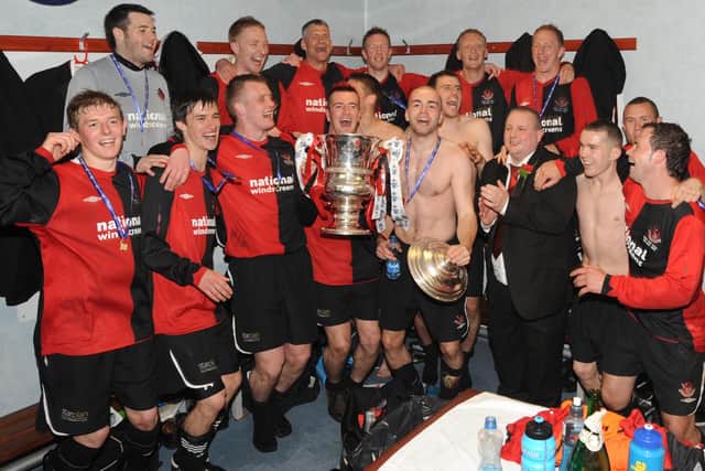 The victorious Crusaders team celebrates winning the 2008/09 Irish Cup final against Cliftonville at Windsor Park, Belfast. PIC: COLM LENAGHAN/PACEMAKER