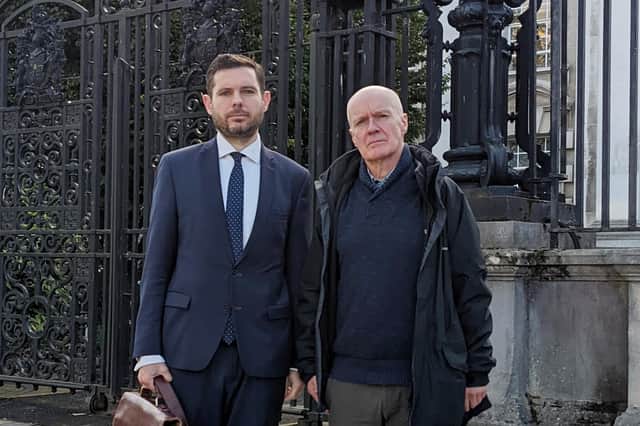 Former sub-postmaster Alan McLaughlin is pictured on the right, alongside his solicitor Michael Madden in October 2022. Photo: Press Eye