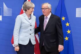EU President Jean-Claude Juncker with then Prime Minister Theresa May at the EU Commission in Brussels on December 8 2017, the day of the EU-UK joint report. It baked in Northern Ireland aligning with EU rules, a major UK negotiating error