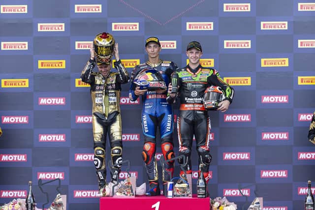 Jonathan Rea on the podium with race winner Toprak Razgatioglu and runner-up and new World Superbike champion Alvaro Bautista at Mandalika in Indonesia.