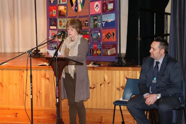 Trooper John Gibbon's widow Linda McHugh, speaking at an event organised by SEFF, alongside SEFF director of services, Kenny Donaldson
