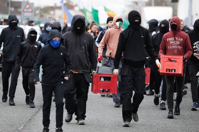 Republican youths with petrol bombs at the annual 1916 Easter Rising parade in the Creggan area of Londonderry. Photo: Kelvin Boyes /Press Eye