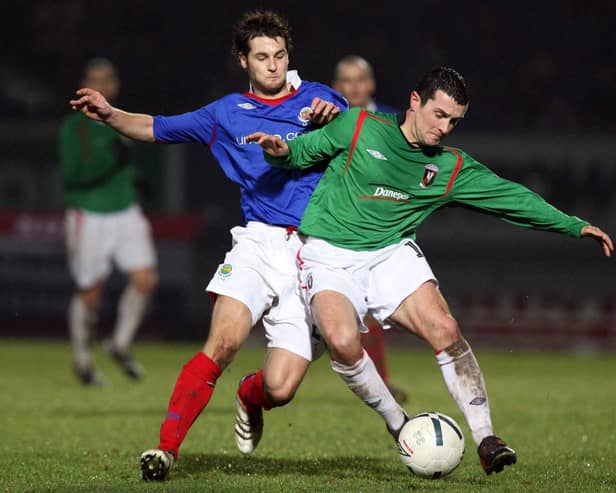 Peter McCann in Boxing Day action against Glentoran's Big Two rivals Linfield in 2006. PIC: Press Eye/Andrew Paton