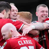 Crusaders celebrate scoring an injury-time winner over Coleraine for a 3-2 victory in the European play-off final at Seaview. (Photo by David Maginnis/Pacemaker Press)