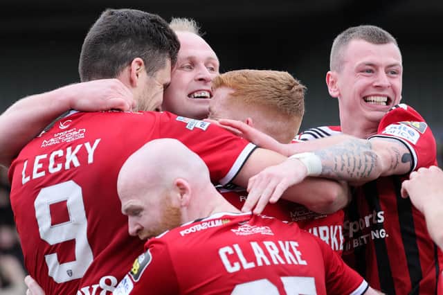 Crusaders celebrate scoring an injury-time winner over Coleraine for a 3-2 victory in the European play-off final at Seaview. (Photo by David Maginnis/Pacemaker Press)