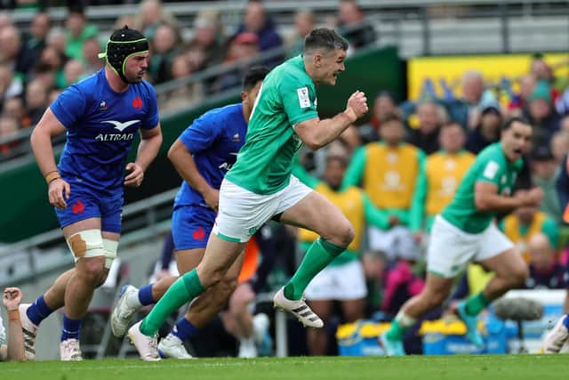 Johnny Sexton of Ireland breaks with the ball during the Six Nations Rugby match between Ireland and France at the Aviva Stadium.