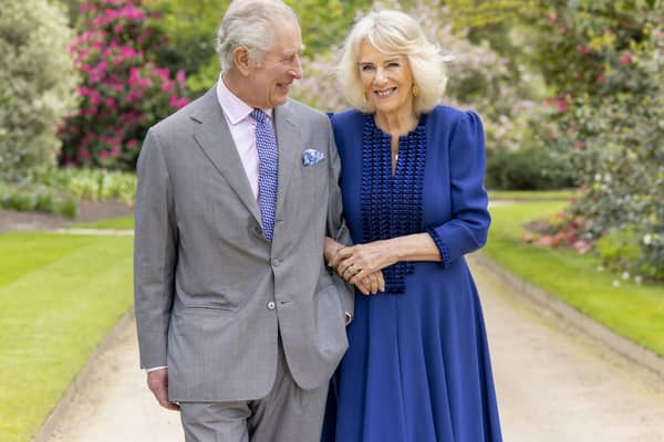 King Charles and Queen Camilla, taken by portrait photographer Millie Pilkington, in Buckingham Palace Gardens on April 10, the day after their 19th wedding anniversary.