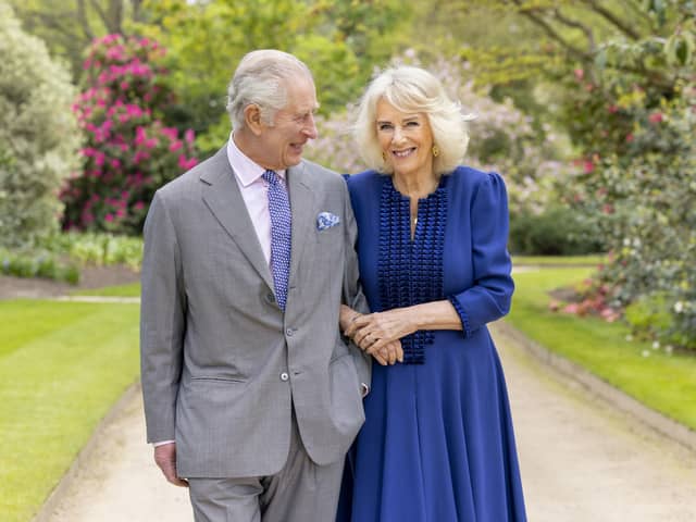 King Charles and Queen Camilla, taken by portrait photographer Millie Pilkington, in Buckingham Palace Gardens on April 10, the day after their 19th wedding anniversary.