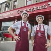 James Cunningham Jnr, left, is pictured with brother Christopher outside the multi-award-winning butchery, deli and restaurant in Kilkeel