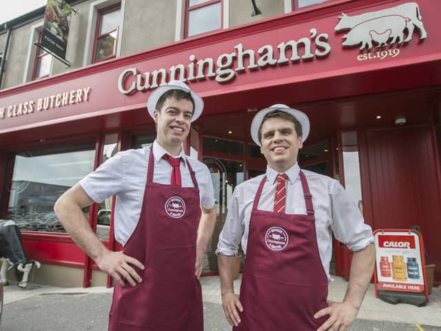 James Cunningham Jnr, left, is pictured with brother Christopher outside the multi-award-winning butchery, deli and restaurant in Kilkeel