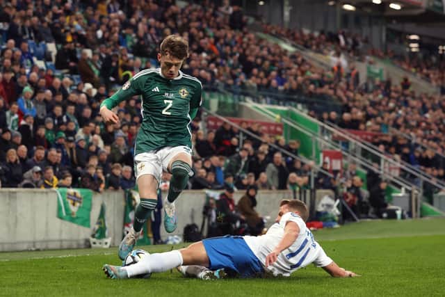 Conor Bradley in action for Northern Ireland against Finland
