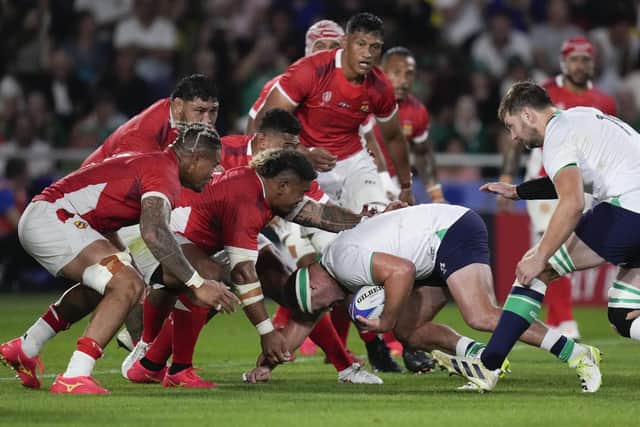 Ireland's Rob Herring runs at Tonga during the Rugby World Cup weekend win. (Photo by AP Photo/Thibault Camus)
