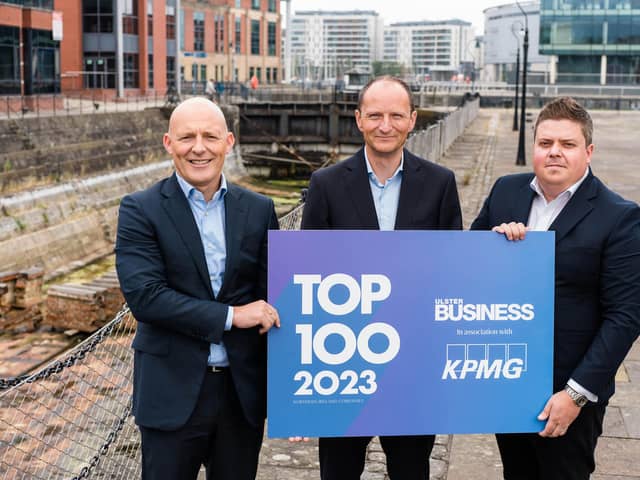 The Ulster Business Top 100 with KPMG ranks Northern Ireland's biggest firms by turnover. Pictured are Johnny Hanna, partner in charge of KPMG in Northern Ireland, William Barnett, chief executive, W&R Barnett and John Mulgrew, Ulster Business editor