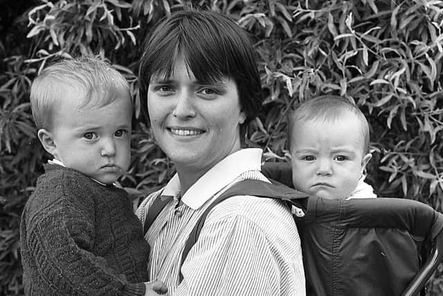 Pictured in May 1992 at the Balmoral Show is Moira Mulholland from Belfast, with her children Patrick and Jane. Picture: News Letter archives/Darryl Armitage