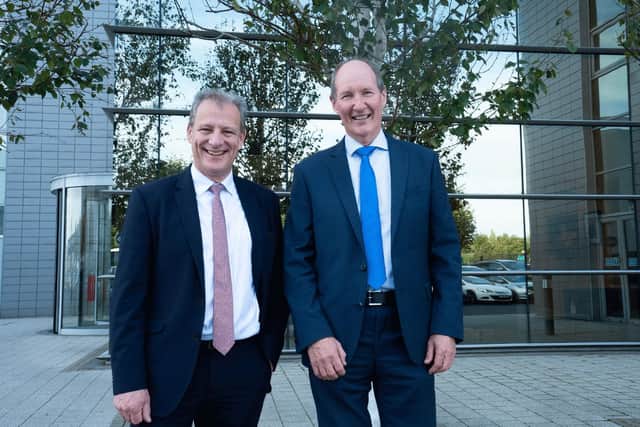 The Almac Group has announced details of an £80 million investment programme to build new extensive manufacturing, production and diagnostic laboratory facilities at its global headquarters in Craigavon. Pictured are Jeremy Fitch, executive director of business growth group, Invest Northern Ireland with Alan Armstrong, chief executive of Almac Group