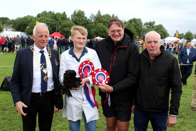Willie Anderson (second right) congratulates Matthew Donnelly on winning the Champion of Champions accolade at Omagh Show 2023. Adding their congratulations: Gerald McFarland (left) Chairman of Tyrone Farming Society and Stephen Hunter of Stephen Hunter Lawnmowers Ltd