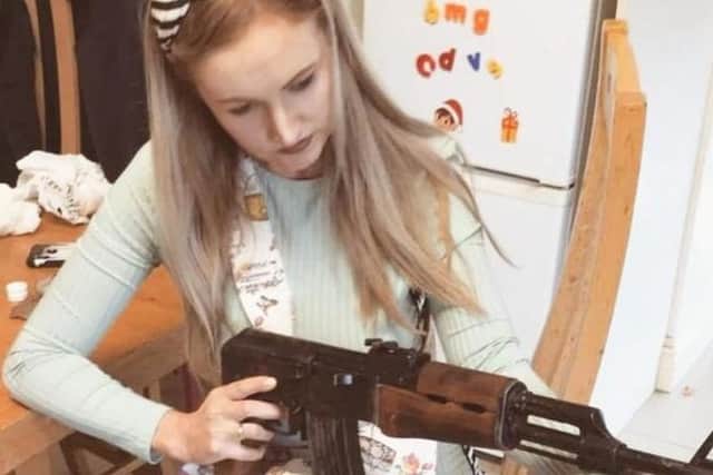 DUP MP Gavin Robinson wrote to the Chief Constable about the photo of the woman holding an alleged AK-47 in a kitchen.