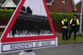PSNI officers on duty at the Garvaghy Road during the stand off between protestors and Orangemen. Picture date: Sunday October 4, 2026.