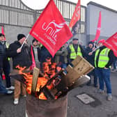Workers take strike action at Short Strand bus depot in December 2023. Photo: Colm Lenaghan/Pacemaker