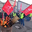 Workers take strike action at Short Strand bus depot in December 2023. Photo: Colm Lenaghan/Pacemaker