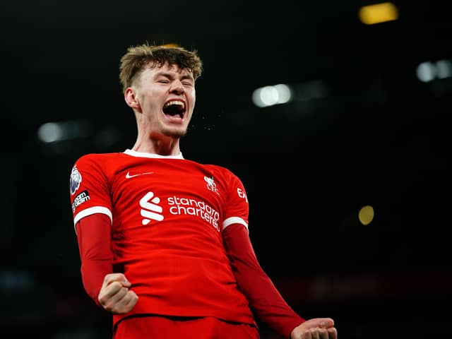 Liverpool's Conor Bradley celebrates after assisting their side's third goal of the game scored by Dominik Szoboszlai during the Premier League match at Anfield, Liverpool. PIC: Peter Byrne/PA Wire.