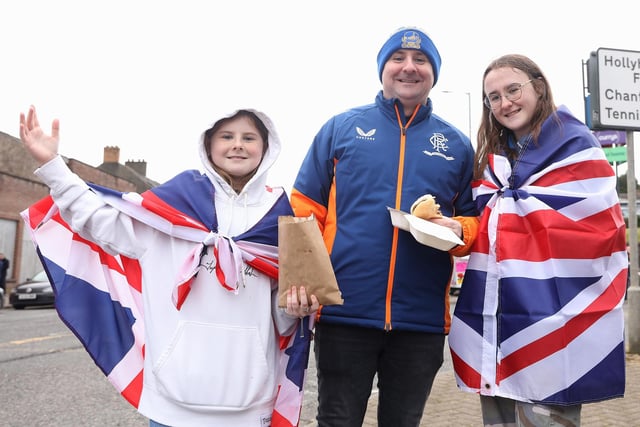 Maisie, Marc and Sophie Young from Newtonards all enjoying a burger on their day out in the parade in Enniskillen