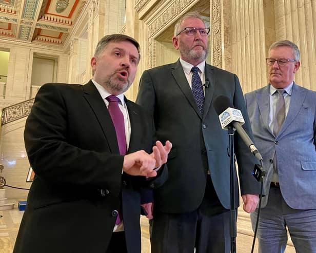 L-R: Health Minister Robin Swann; UUP leader Doug Beattie and UUP MLA Mike Nesbitt speak to members of the media in the Great Hall of Parliament Buildings at Stormont. Photo: David Young/PA Wire
