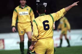 Leslie Irvine, pictured as referee in the late 1990s, has been recognised with an MBE