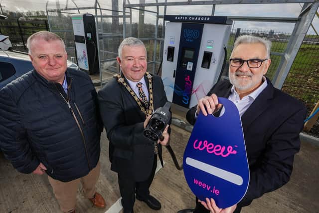 Cllr Ivor Wallace, Mayor of Causeway Coast and Glens Borough Council officially opens Weev’s new ultra-rapid EV charging hub, based at McGuckian Milling Company, Cloughmills, with  Barney McGuckian, owner of McGuckian Milling Company and Philip Rainey, CEO of Weev. The hub is open to the public 24 hours a day with the location chosen to meet the needs of commuters and holidaymakers on one of Northern Ireland’s busiest routes