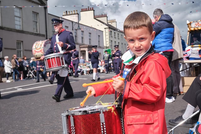 On the sidelines - Issac accompanies the bands during the Last Saturday Demonstration in Moneymore.