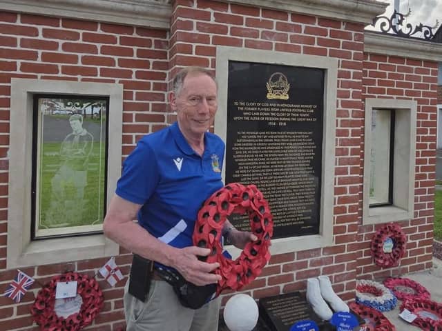 Henry Hughes pictured at the Linfield memorial in Bertrancourt, France