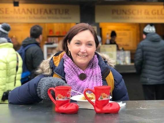 Co Down woman Claire Leathem, who has Raynaud's, wrapped up against the cold