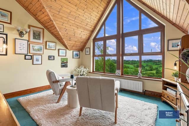 An upstairs study includes a floor to ceiling windows with views over the Mournes. Photo: Robert Wilson Estate Agents