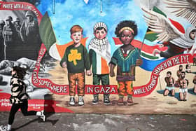 BELFAST, NORTHERN IRELAND - Palestinian solidarity murals on the International Wall on the Falls Road, March 18, 2024 in Belfast, Northern Ireland. As of May 28, the Irish government has formally recognised the State of Palestine