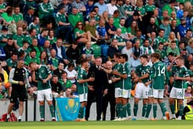 Northern Ireland manager Michael O'Neill speaks with his players during a water break in the UEFA Euro 2024 qualifying campaign at the National Football Stadium at Windsor Park, Belfast. (Photo by Liam McBurney/PA Wire)