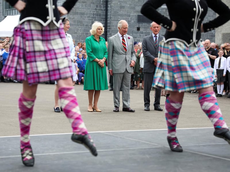 King Charles III and Queen Camilla watch dancers as they visit Enniskillen Castle