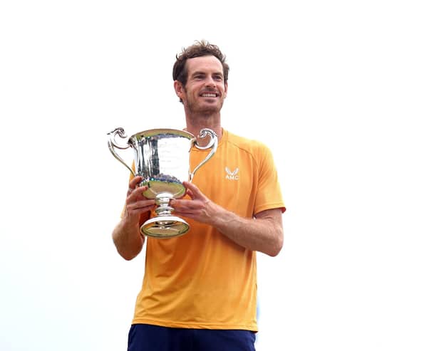 Great Britain's Andy Murray celebrates with the trophy after victory in the Men's Singles Final against Austria's Jurij Rodionov on day seven of the 2023 Lexus Surbiton Trophy at Surbiton Racket and Fitness Club, London