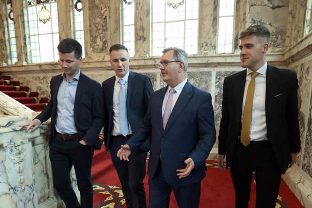 DUP MLA Jonathan Buckley with Councillor Andrew McCormick, DUP leader Sir Jeffery Donaldson and Councillor Dean McCullough at the Northern Ireland council elections at Belfast City Hall. Picture date: Saturday May 20, 2023.