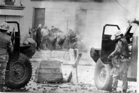 Soldiers taking cover behind their sandbagged armoured cars while dispersing rioters with CS gas in Londonderry on Bloody Sunday in 1972. Last week, Soldier F was found not guilty of two murders and five attempted murders following a judge-led trial at Belfast Crown Court