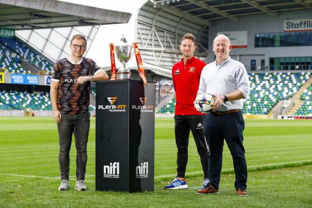 Annagh United's Ryan Moffatt at the Playr-Fit Championship launch night with, from left, Playr-Fit's Darren McPolin and Kieran Quinn. Photo by Phil Magowan/PressEye